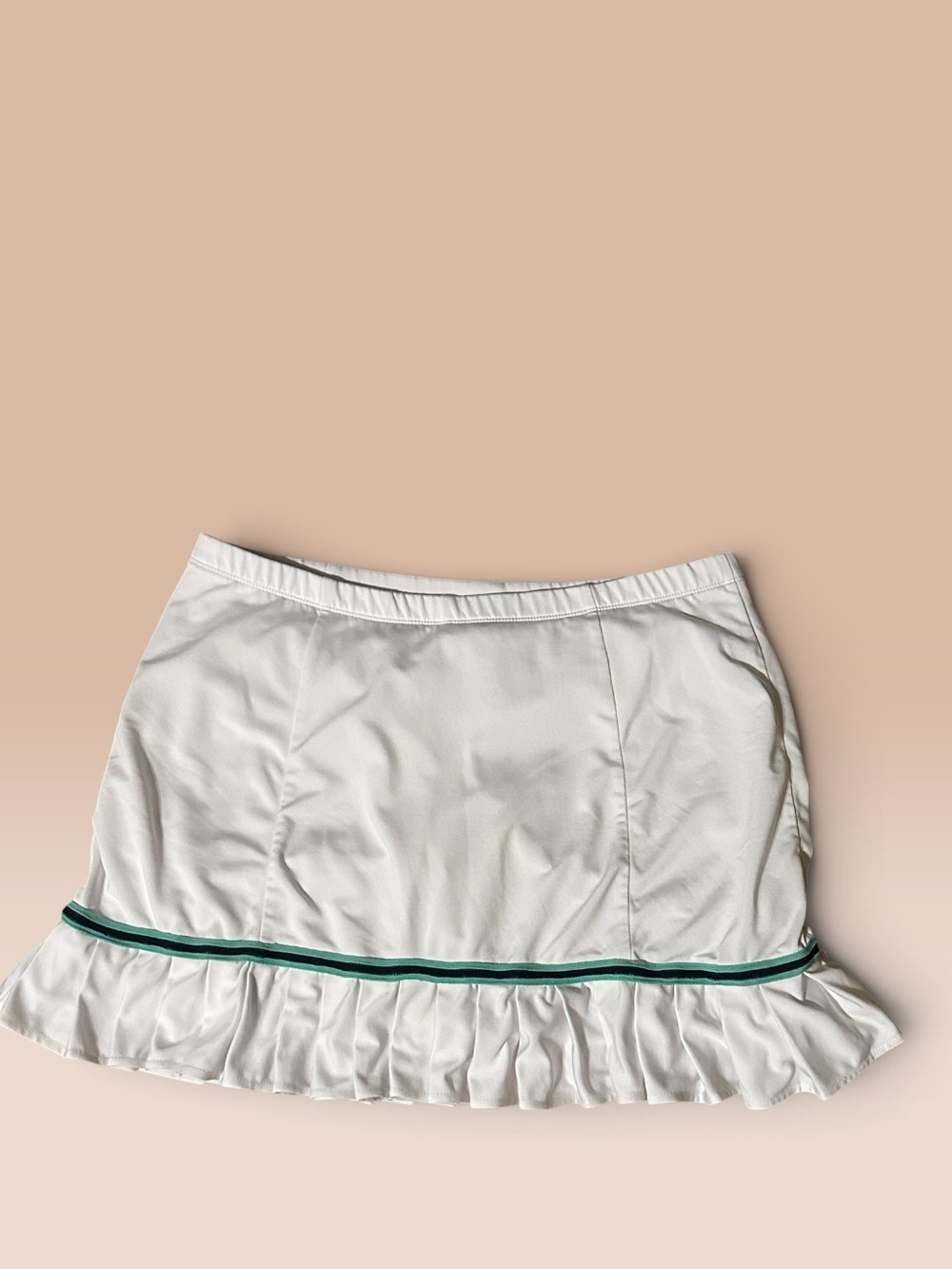 White Mini Skirt with Green Trim and Ruffled Hem